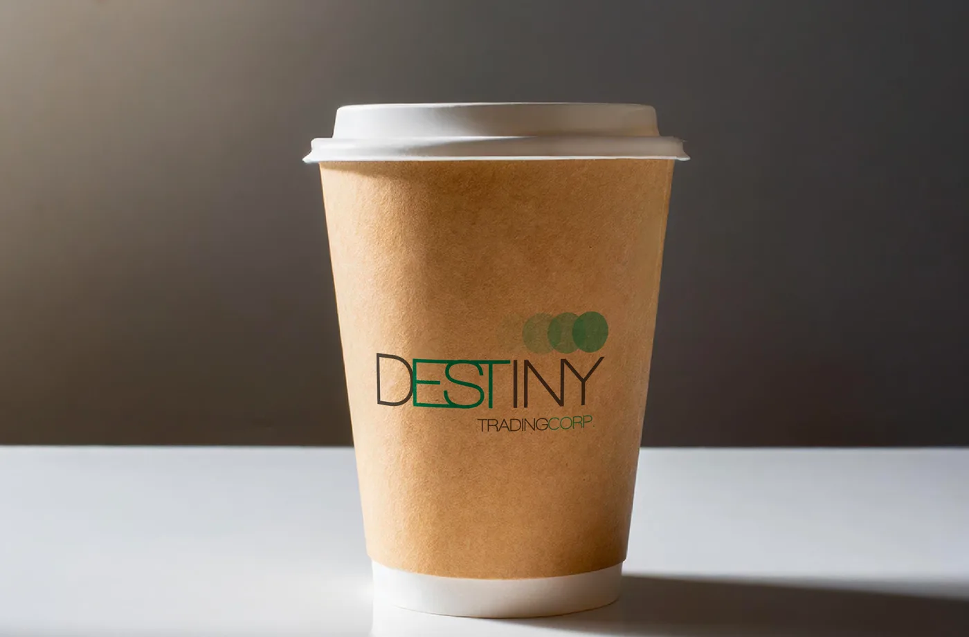 Destiny Trading Corp. logo on coffee cup